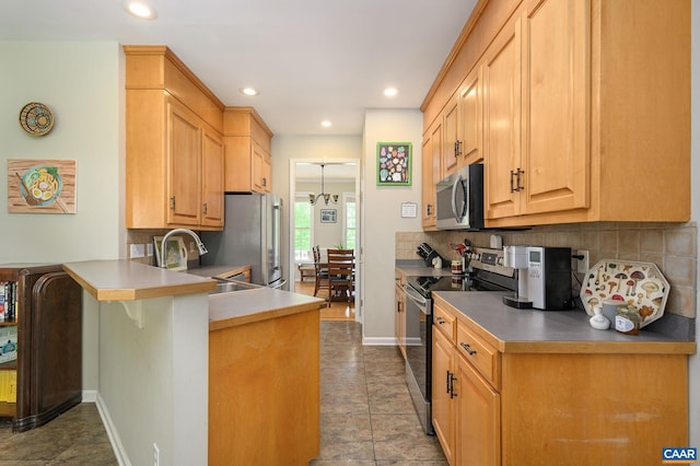 2364 N Chesterfield Ct, Charlottesville, VA 22911 - kitchen featuring appliances with stainless steel finishes, a sink, tasteful backsplash, a peninsula, and recessed lighting