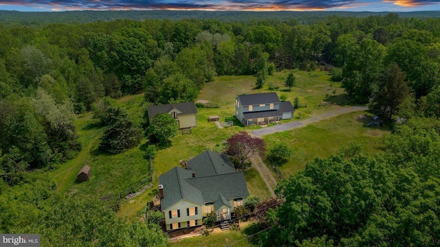 bird's eye view featuring a view of trees