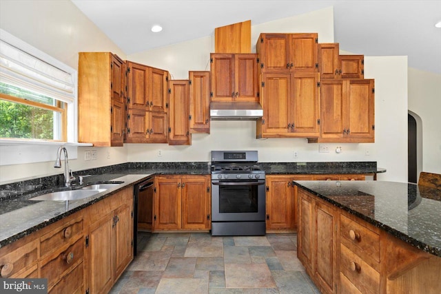 kitchen with lofted ceiling, stainless steel range with gas cooktop, ventilation hood, a sink, and dishwasher