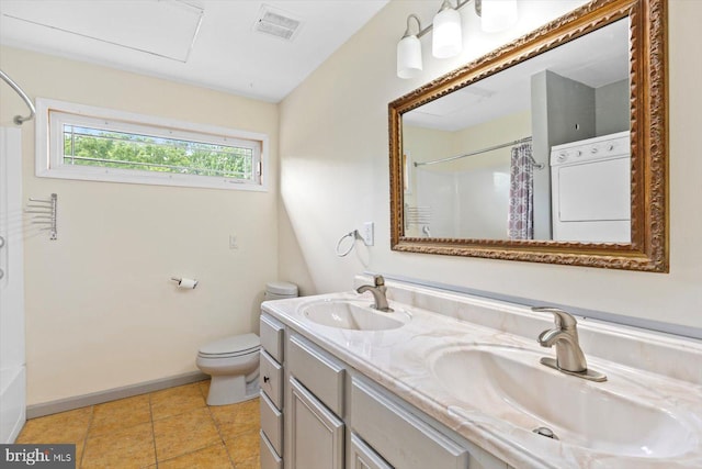 bathroom with a sink, a shower with curtain, toilet, and double vanity