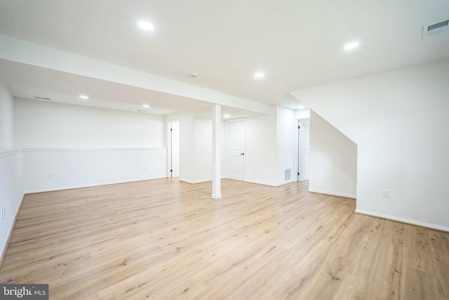 1797 Valleyside Dr, Frederick, MD 21702 - finished basement with light wood-type flooring, recessed lighting, and baseboards