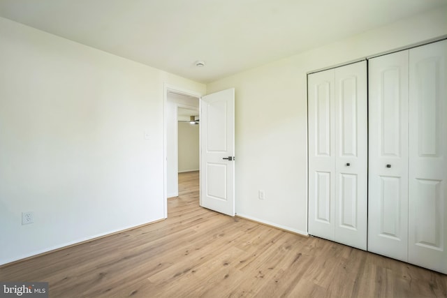 1797 Valleyside Dr, Frederick, MD 21702 - unfurnished bedroom featuring wood finished floors, baseboards, and a closet