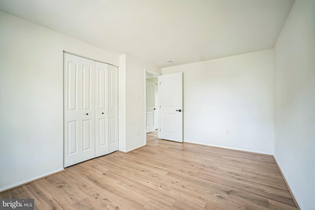 1797 Valleyside Dr, Frederick, MD 21702 - unfurnished bedroom featuring wood finished floors, a closet, and baseboards