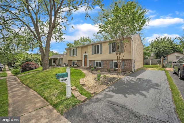 1797 Valleyside Dr, Frederick, MD 21702 - raised ranch featuring brick siding and driveway