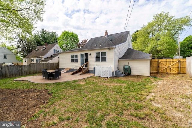 404 Crescent Rd, Hatboro, PA 19040 - rear view of property with a fenced backyard, a patio, a chimney, and a lawn
