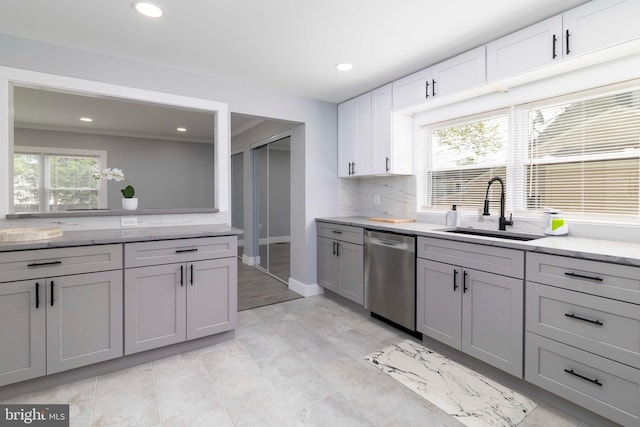 404 Crescent Rd, Hatboro, PA 19040 - kitchen with recessed lighting, dishwasher, light stone counters, a sink, and white cabinetry