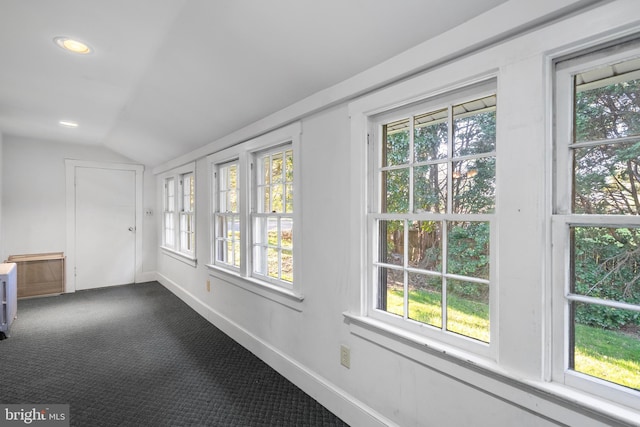 unfurnished sunroom featuring plenty of natural light