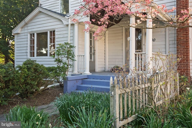 entrance to property with covered porch
