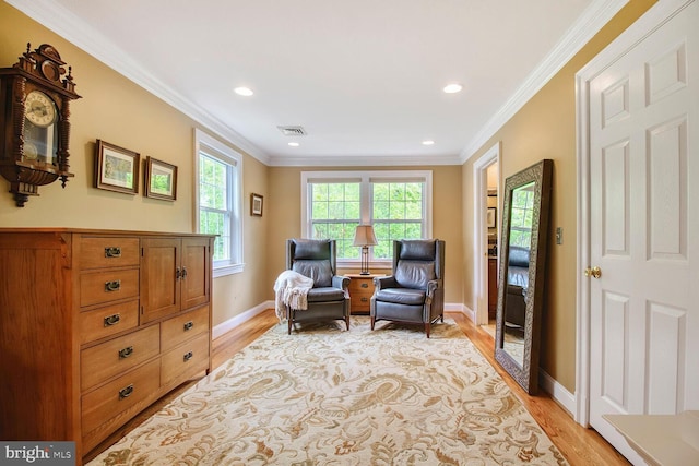 sitting room with light wood finished floors, visible vents, baseboards, and recessed lighting