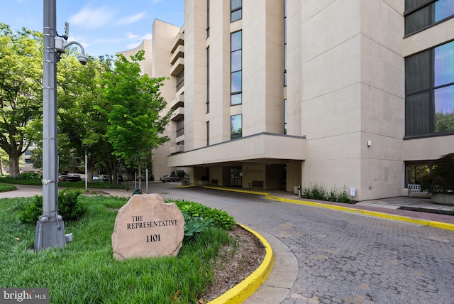 1101 S Arlington Ridge Rd Unit 1107, Arlington, VA 22202 - view of building exterior featuring uncovered parking