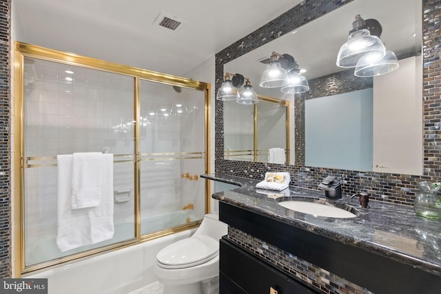 1101 S Arlington Ridge Rd Unit 1107, Arlington, VA 22202 - full bath featuring toilet, shower / bath combination with glass door, vanity, and tasteful backsplash