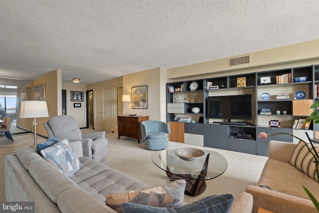 1101 S Arlington Ridge Rd Unit 1107, Arlington, VA 22202 - living area featuring light carpet and a textured ceiling