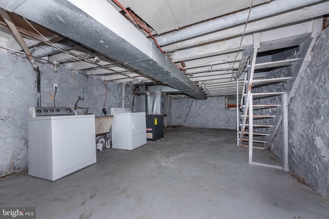 unfinished basement with washer and dryer