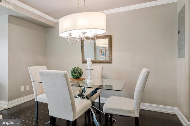418 Seward Sq SE Unit 3, Washington, DC 20003 - dining room with baseboards, a chandelier, crown molding, dark wood finished floors, and electric panel