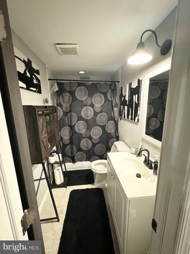 5902 Middleton Ct, Temple Hills, MD 20748 - bathroom with vanity, toilet, curtained shower, and tile patterned floors