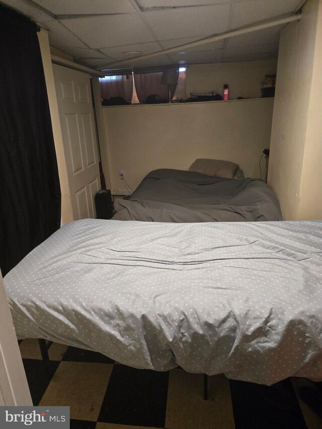 bedroom with a drop ceiling