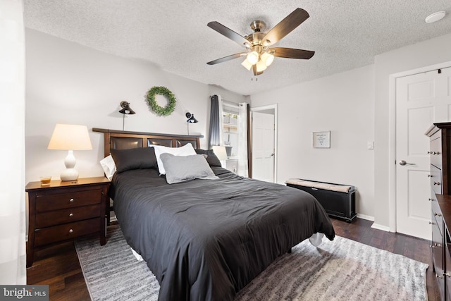 54 Dogwood Rd, Manahawkin, NJ 08050 - bedroom featuring a textured ceiling and dark wood-type flooring