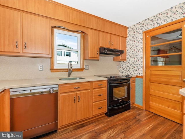 9203 Oak Tree Cir, Frederick, MD 21701 - kitchen featuring black range with electric cooktop, dishwashing machine, wallpapered walls, under cabinet range hood, and a sink