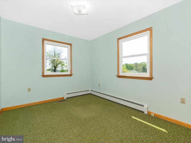 9203 Oak Tree Cir, Frederick, MD 21701 - carpeted empty room featuring baseboards and a baseboard heating unit