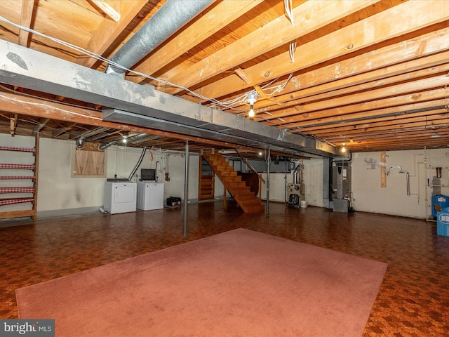 9203 Oak Tree Cir, Frederick, MD 21701 - unfinished basement with washer and dryer, water heater, heating unit, and stairway