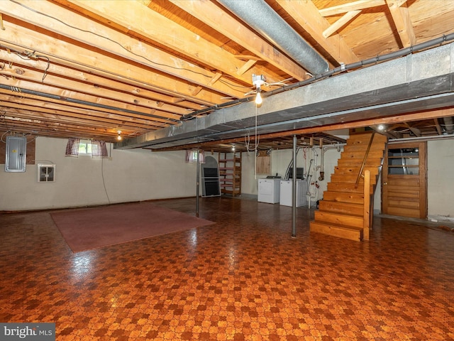 9203 Oak Tree Cir, Frederick, MD 21701 - below grade area with stairway, electric panel, and washing machine and dryer