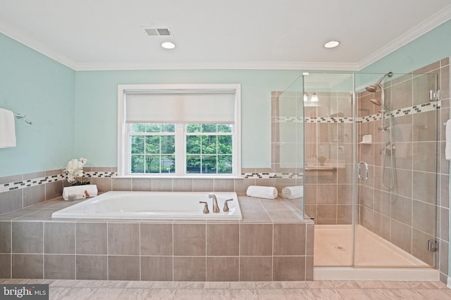 bathroom featuring a shower stall, ornamental molding, visible vents, and a bath