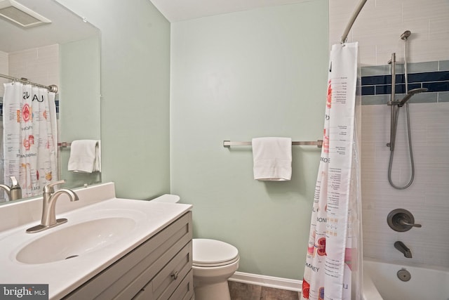 bathroom featuring toilet, baseboards, shower / tub combo with curtain, visible vents, and vanity