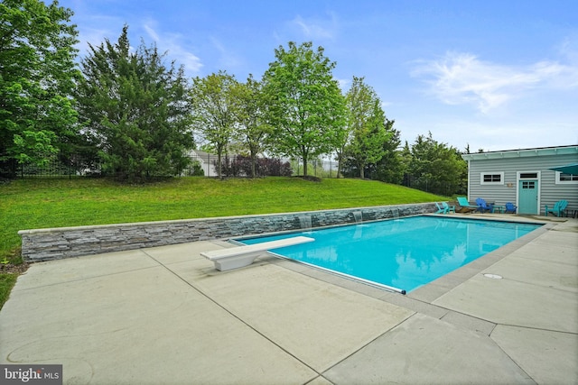 view of swimming pool with a yard, a patio area, a fenced backyard, and a fenced in pool