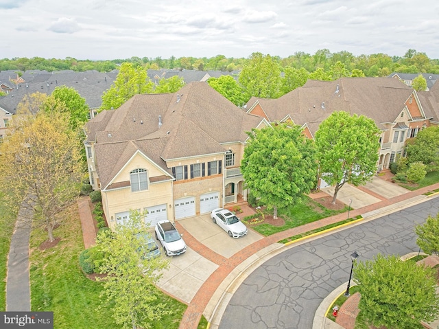 drone / aerial view with a residential view
