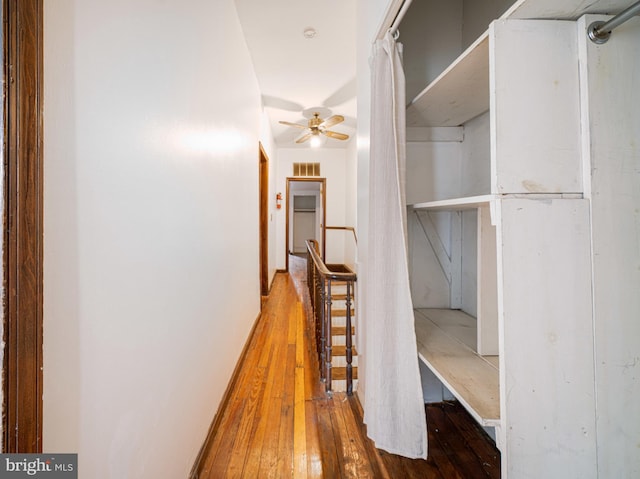 hall featuring wood-type flooring