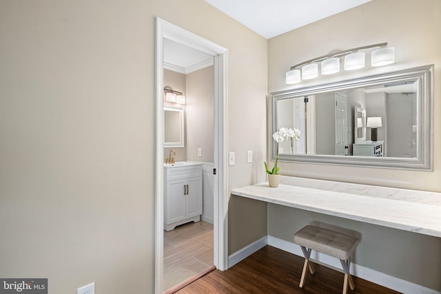 56 E Holly Ave, Sewell, NJ 08080 - bathroom featuring baseboards, wood finished floors, and vanity