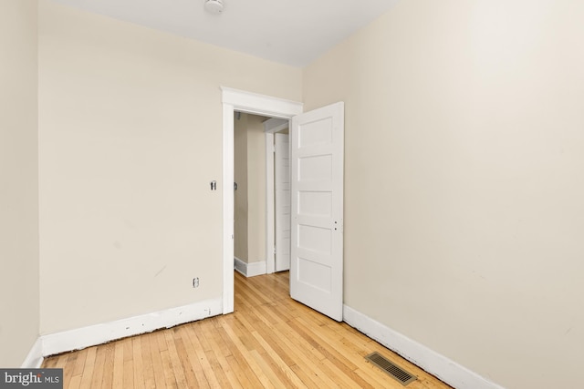 1222 18th St NE, Washington, DC 20002 - unfurnished room with baseboards, visible vents, and light wood-style flooring