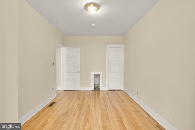 1222 18th St NE, Washington, DC 20002 - empty room featuring baseboards, light wood-type flooring, and visible vents