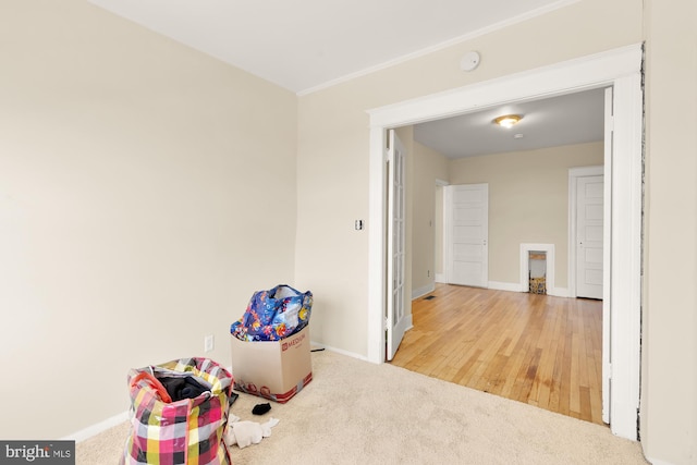 1222 18th St NE, Washington, DC 20002 - game room featuring baseboards, carpet floors, and wood finished floors