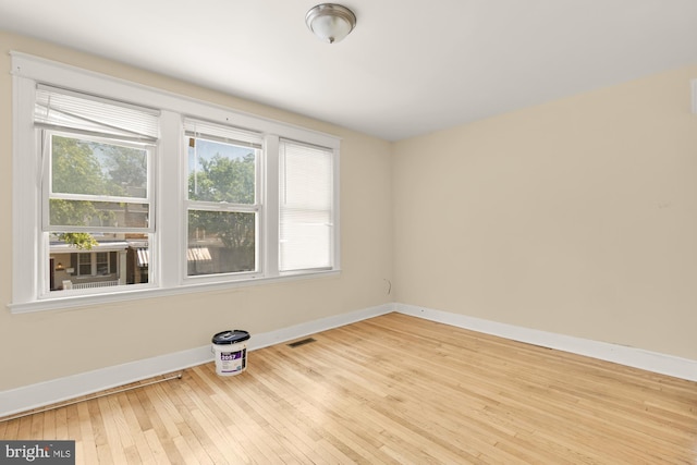 1222 18th St NE, Washington, DC 20002 - unfurnished room featuring baseboards, visible vents, and hardwood / wood-style flooring