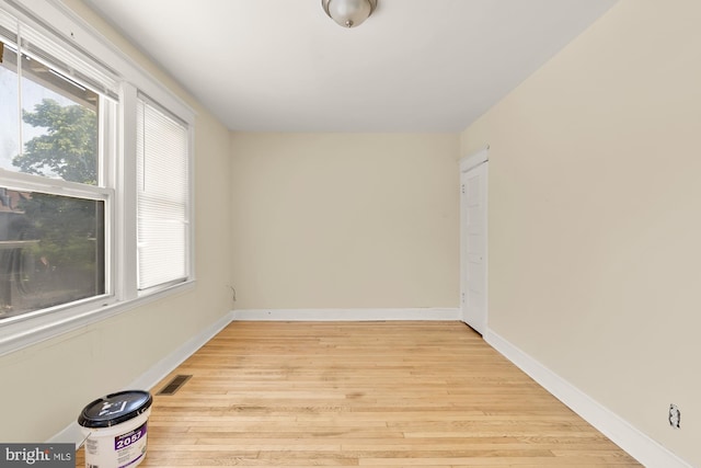 1222 18th St NE, Washington, DC 20002 - unfurnished room with baseboards, visible vents, and light wood-style floors