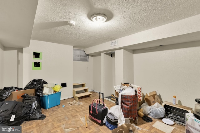 1222 18th St NE, Washington, DC 20002 - finished below grade area featuring a textured ceiling and visible vents