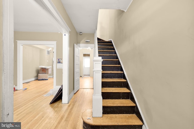 1222 18th St NE, Washington, DC 20002 - stairs with baseboards and wood-type flooring