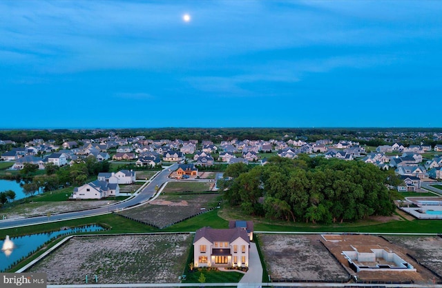 76 Filly Ln, Lewes, DE 19958 - aerial perspective of suburban area with a nearby body of water
