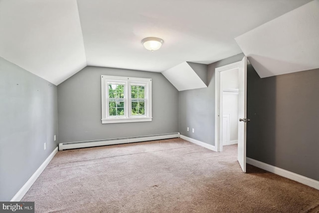 bonus room featuring carpet flooring, baseboards, baseboard heating, and lofted ceiling