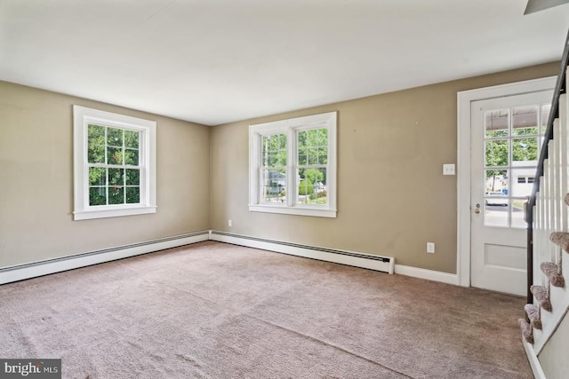 interior space featuring baseboards and a baseboard radiator