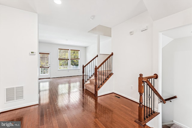 8210 Heritage Crossing Ct, Manassas, VA 20109 - corridor with hardwood / wood-style floors, baseboards, stairway, and recessed lighting