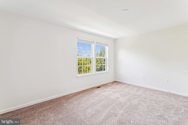 8210 Heritage Crossing Ct, Manassas, VA 20109 - carpeted spare room with baseboards