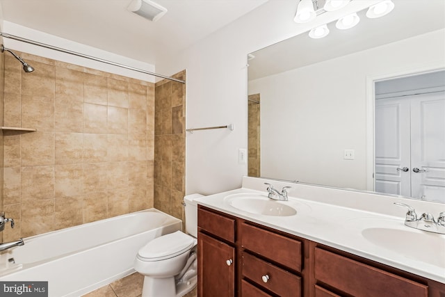 8210 Heritage Crossing Ct, Manassas, VA 20109 - full bath with double vanity, shower / bath combination, toilet, and tile patterned floors