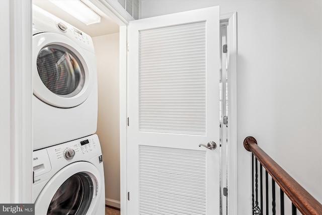 8210 Heritage Crossing Ct, Manassas, VA 20109 - washroom with stacked washer and clothes dryer