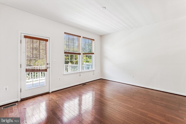 8210 Heritage Crossing Ct, Manassas, VA 20109 - spare room with wood-type flooring and baseboards