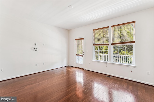 8210 Heritage Crossing Ct, Manassas, VA 20109 - spare room with wood finished floors and baseboards