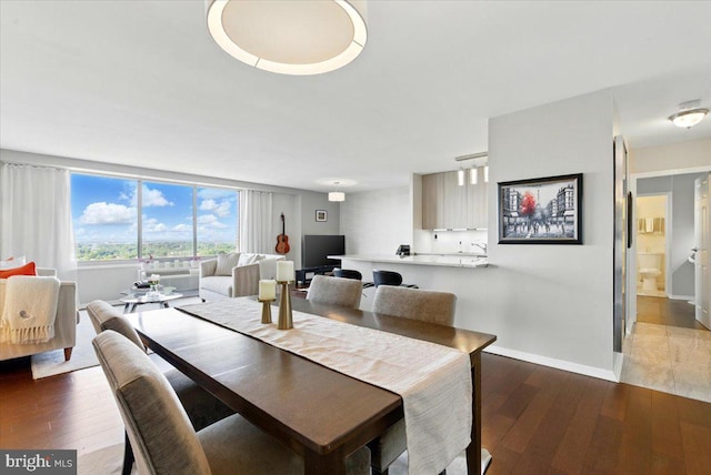 9701 Fields Rd Unit 2301, Gaithersburg, MD 20878 - dining area featuring wood-type flooring and baseboards