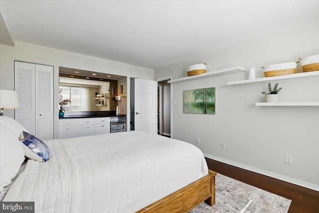 9701 Fields Rd Unit 2301, Gaithersburg, MD 20878 - bedroom featuring wood finished floors and baseboards
