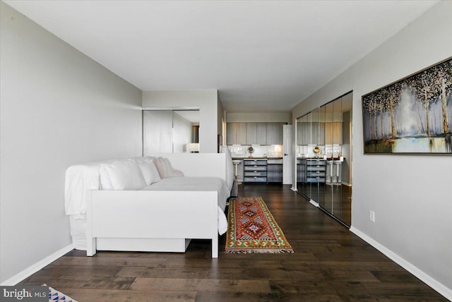 9701 Fields Rd Unit 2301, Gaithersburg, MD 20878 - bedroom featuring wood finished floors and baseboards